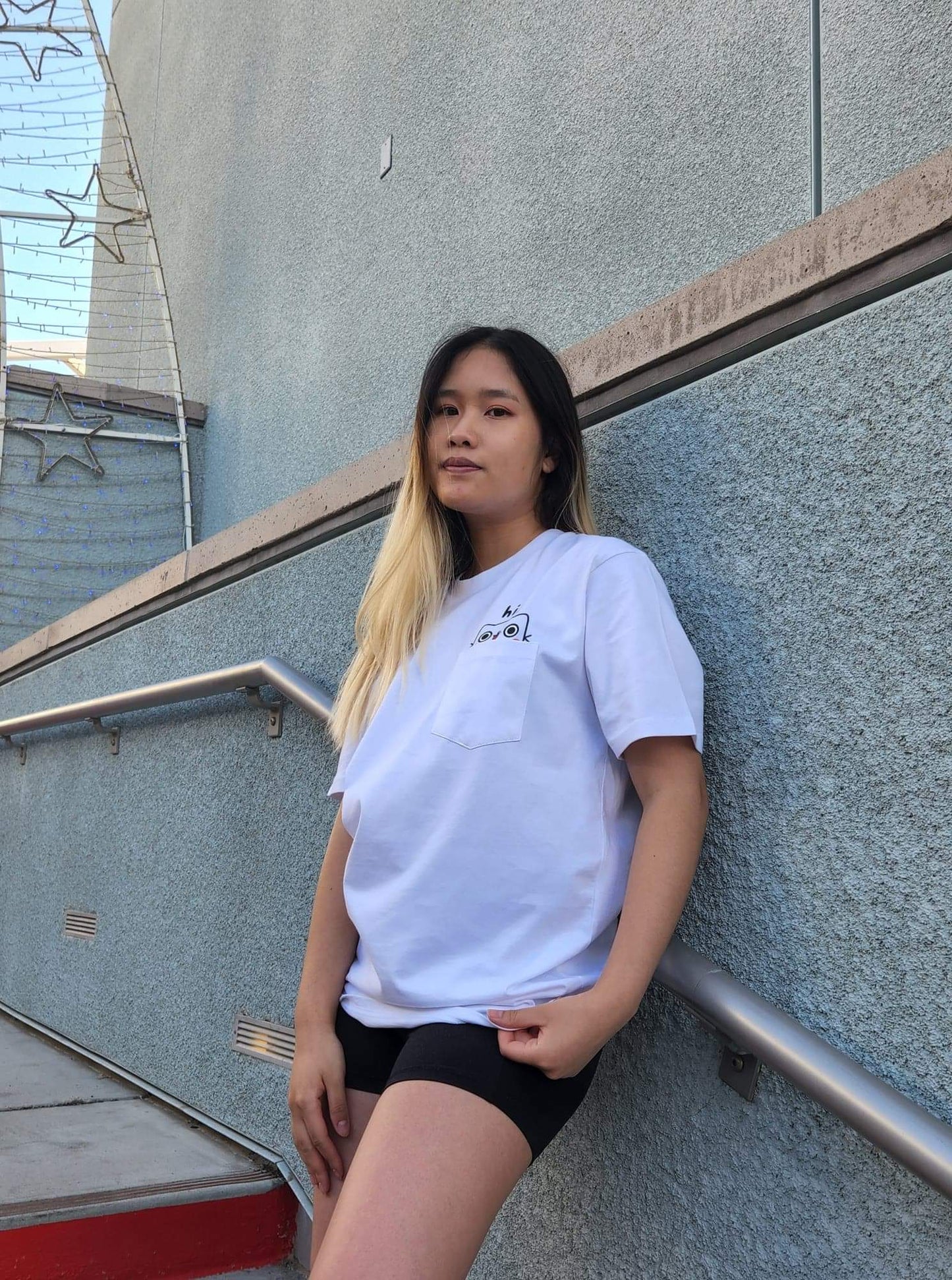 person modelling a white shirt